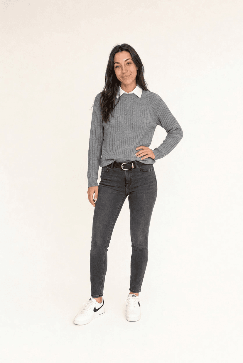 Smart casual work outfit — grey knit over white collar and dark jeans